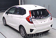 Хэтчбек гибрид HONDA FIT HYBRID кузов GP5 модификация Hybrid L Package гв 2014 пробег 45 т.км белый  Москва