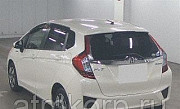 Хэтчбек гибрид HONDA FIT HYBRID кузов GP5 модификация Hybrid F Package гв 2014 пробег 61 тыс км жемч Москва