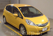 Хэтчбек гибрид HONDA FIT HYBRID кузов GP1 модификация Hybrid Navi гв 2011 пробег 105 т.км желтый цит Москва