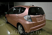 Хэтчбек гибрид HONDA FIT HYBRID кузов GP1 модификация Hybrid год выпуска 2012 пробег 76 т.км розовый Москва