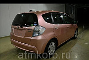 Хэтчбек гибрид HONDA FIT HYBRID кузов GP1 модификация Hybrid год выпуска 2012 пробег 76 т.км розовый Москва
