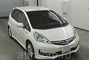Хэтчбек гибрид HONDA FIT HYBRID кузов GP4 модификация Hybrid RS год выпуска 2012 пробег 121 т.км бел Москва