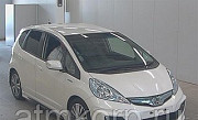 Хэтчбек гибрид HONDA FIT HYBRID кузов GP4 модификация Hybrid RS год выпуска 2012 пробег 70 т.км жемч Москва