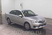 Автомобиль седан гибрид TOYOTA COROLLA AXIO Москва