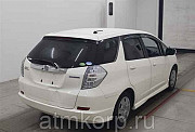 Универсал гибрид HONDA FIT SHUTTLE HYBRID кузов GP2 модификация Hybrid гв 2012 пробег 137 т.км белый Москва