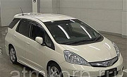 Универсал гибрид HONDA FIT SHUTTLE HYBRID кузов GP2 модификация Hybrid гв 2012 пробег 159 т.км жемчу Москва