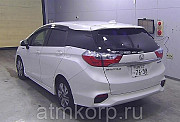 Универсал гибрид Honda SHUTTLE HYBRID кузов GP7 модификация X гв 2015 пробег 71 т.км белый жемчуг Москва