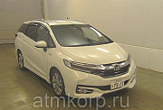 Универсал гибрид Honda SHUTTLE HYBRID кузов GP7 модификация Z гв 2015 пробег 48 т.км белый жемчуг Москва