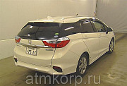 Универсал гибрид Honda SHUTTLE HYBRID кузов GP7 модификация Z гв 2015 пробег 48 т.км белый жемчуг Москва