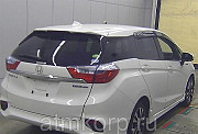 Универсал гибрид Honda SHUTTLE HYBRID кузов GP7 модификация X гв 2016 пробег 58 т.км белый Москва