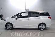 Универсал гибрид Honda SHUTTLE HYBRID кузов GP7 модификация Z гв 2015 пробег 47 т.км белый Москва