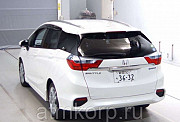 Универсал гибрид Honda SHUTTLE HYBRID кузов GP7 модификация Z гв 2015 пробег 47 т.км белый Москва