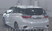 Универсал гибрид Honda SHUTTLE HYBRID кузов GP7 модификация X гв 2016 пробег 26 т.км жемчужный Москва