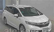 Универсал гибрид Honda SHUTTLE HYBRID кузов GP7 модификация Z гв 2015 пробег 31 т.км жемчужный Москва