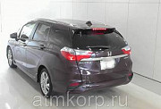 Универсал гибрид Honda SHUTTLE HYBRID кузов GP7 модификация Z гв 2015 пробег 10 т.км пурпурный Москва