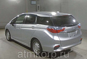 Универсал гибрид Honda SHUTTLE HYBRID кузов GP7 гв 2016 пробег 181 т.км серебристый Москва