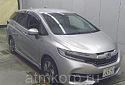 Универсал гибрид Honda SHUTTLE HYBRID кузов GP7 модификация X гв 2015 пробег 158 т.км серебристый Москва