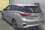 Универсал гибрид Honda SHUTTLE HYBRID кузов GP7 модификация X гв 2015 пробег 158 т.км серебристый Москва