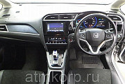 Универсал гибрид Honda SHUTTLE HYBRID кузов GP7 модификация X гв 2015 пробег 158 т.км серебристый Москва