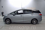 Универсал гибрид Honda SHUTTLE HYBRID кузов GP7 модификация Z гв 2015 пробег 79 т.км серебристый Москва