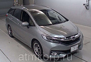 Универсал гибрид Honda SHUTTLE HYBRID кузов GP7 модификация Z гв 2015 пробег 79 т.км серебристый Москва