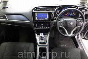 Универсал гибрид Honda SHUTTLE HYBRID кузов GP7 гв 2015 пробег 27 т.км серый Москва