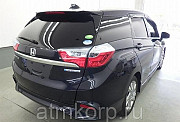 Универсал гибрид Honda SHUTTLE HYBRID кузов GP7 модификация Z гв 2015 пробег 68 т.км темно-синий Москва