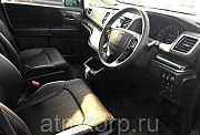 Минивэн гибрид Honda Odyssey 7 мест HV Absolute H Sensing Advanced P г 2016 пробег 28 т.км фиолетовы Москва