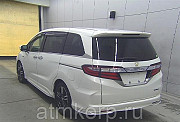 Минивэн гибрид 7 мест Honda Odyssey Hybrid Absolute Honda S EX Package гв 2016 пробег 108 т.км белый Москва