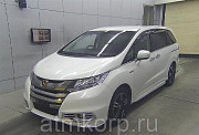 Минивэн гибрид 7 мест Honda Odyssey Hybrid Absolute Honda S EX Package гв 2016 пробег 108 т.км белый Москва