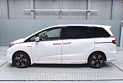 Минивэн гибрид Honda Odyssey Hybrid кузов RC4 7 мест EX Package гв 2016 пробег 75 т.км белый перламу Москва