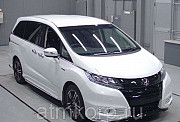 Минивэн гибрид Honda Odyssey Hybrid кузов RC4 7 мест EX Package гв 2016 пробег 75 т.км белый перламу Москва