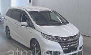 Минивэн гибрид 7 мест Honda Odyssey Hybrid кузов RC4 HV ABU SORUSENSIEXP гв 2016 пробег 54 т/км жемч Москва