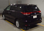 Автомобиль гибрид минивэн TOYOTA ESTIMA HYBRID цвет винный Москва