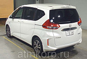 Минивэн гибрид 6 мест HONDA FREED PLUS HYBRID кузов GB7 модификация Hybrid G Honda г 2016 пробег 23  Москва