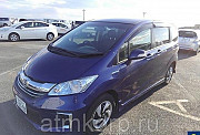 Минивэн гибрид 6 мест HONDA FREED SPIKE HYBRID кузов GP3 модификация г 2015 пробег 79 т.км фиолетовы Москва