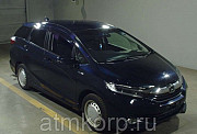 Универсал гибрид Honda SHUTTLE HYBRID кузов GP8 4WD модификация X гв 2016 пробег 130 т.км фиолетовый Москва