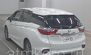 Универсал гибрид Honda SHUTTLE HYBRID кузов GP8 4WD модификация AWD гв 2016 пробег 149 т.км белый Москва