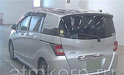 Минивэн HONDA FREED SPIKE кузов GB3 модификация G AERO гв 2014 пробег 61 т.км светло-серый Москва