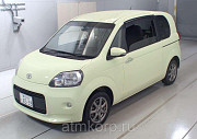 Минивэн TOYOTA PORTE цвет  желтый Москва