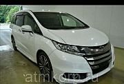 Минивэн 7 мест Honda Odyssey кузов RC1 пятого поколения Absolute EX гв 2014 пробег 186 т.км белый же Москва