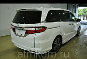 Минивэн 7 мест Honda Odyssey кузов RC1 пятого поколения Absolute EX гв 2014 пробег 186 т.км белый же Москва
