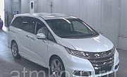 Минивэн VIP 7 мест Honda Odyssey кузов RC1 ABU SORUEX HSENSIN гв 2016 пробег 58 т.км жемчужный Москва