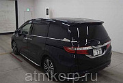 Минивэн 7 мест Honda Odyssey кузов RC1 пятого поколения Absolute EX гв 2014 пробег 85 т.км пурпурный Москва