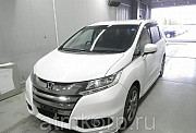 Минивэн 4WD 8 мест Honda Odyssey кузов RC2 пятого поколения Absolute гв 2014 пробег 104 т.км белый ж Москва