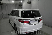 Минивэн 4WD 8 мест Honda Odyssey кузов RC2 пятого поколения Absolute гв 2014 пробег 104 т.км белый ж Москва