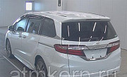 Минивэн 4WD 8 мест Honda Odyssey кузов RC2 ABU SORUX HSENSIN AWD гв 2016 пробег 57 т.км жемчужный Москва