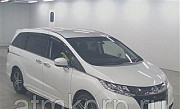 Минивэн 4WD 8 мест Honda Odyssey кузов RC2 пятого поколения ABSOLUTE 20TH AWD гв 2014 пробег 27 т.км Москва