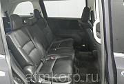 Минивэн 4WD 8 мест Honda Odyssey кузов RC2 пятого поколения Absolute гв 2014 пробег 111 т.км пурпурн Москва