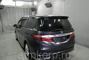 Минивэн 4WD 8 мест Honda Odyssey кузов RC2 пятого поколения Absolute гв 2014 пробег 111 т.км пурпурн Москва